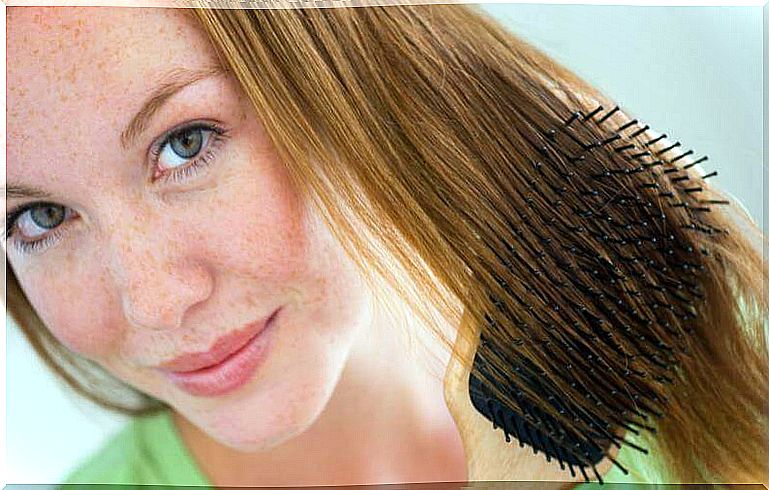 Girl brushing her hair