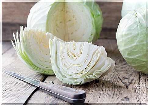 Cabbage on the cutting board and knife