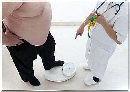 Obese patient on the scales at the doctor.